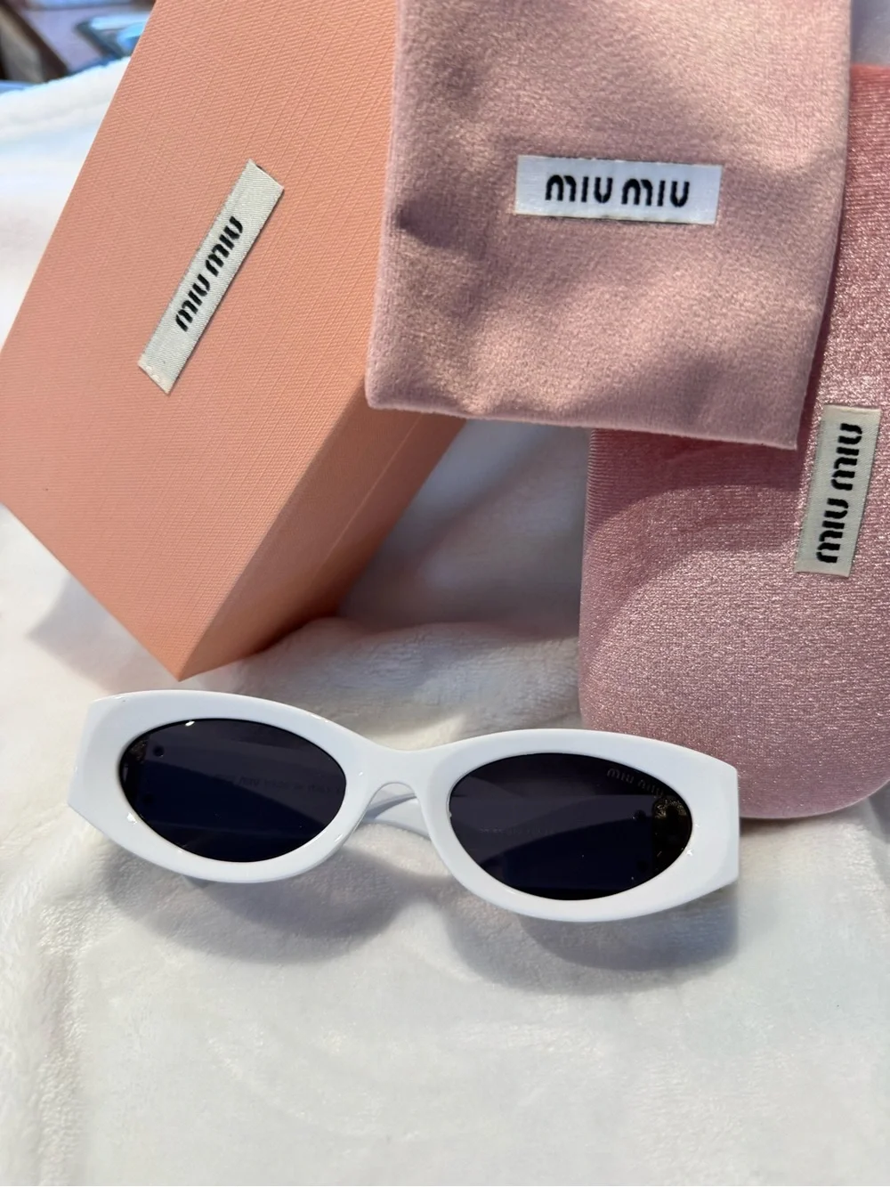 Miu Miu White Oval Sunglasses for Women - Chic Designer Shades